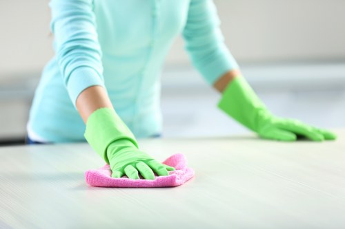 Experienced cleaners restoring carpet appearance in Ealing
