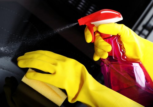Commercial cleaners vacuuming carpets in an Ealing workplace