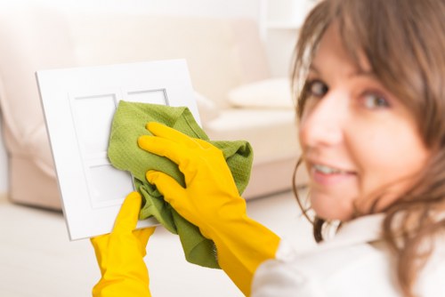 Technician sorting recyclable cleaning waste at a local transfer station